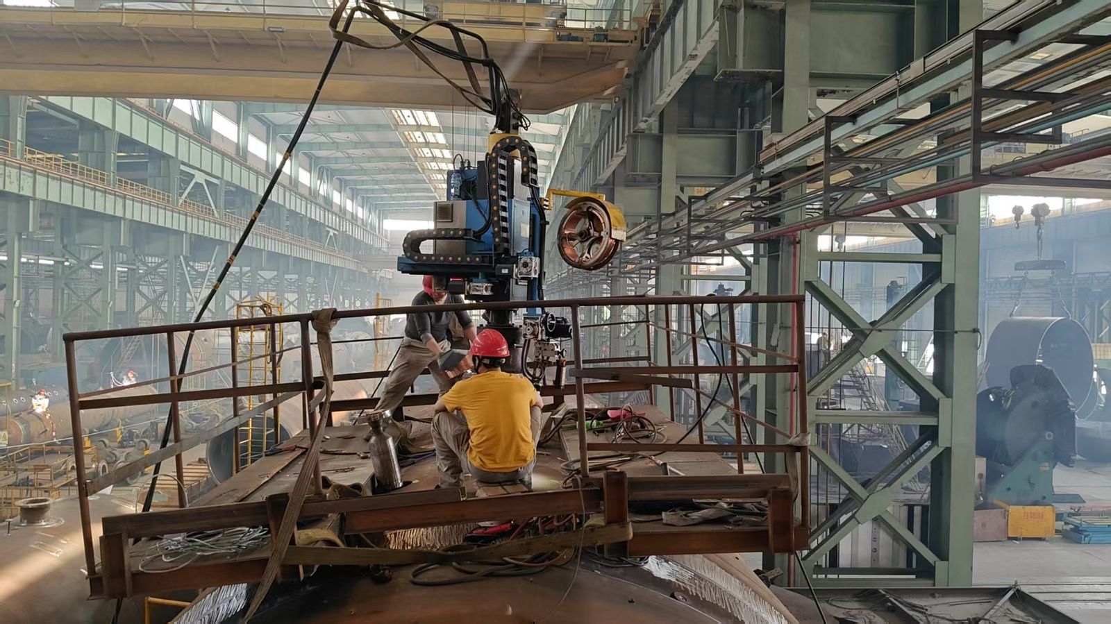 Welding a vessel shell in the shop