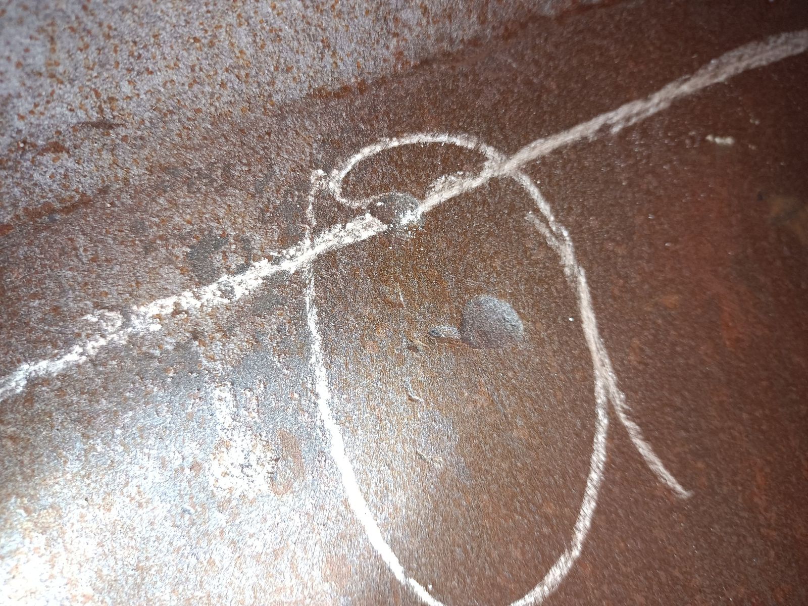 Plate defect marked by the inspector